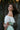 Tween girl wearing Pale mint pastel two-piece set by Tea Princess –off the shoulder top and flowy skirt