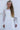 close-up of young girl wearing lace bodice on first communion dress