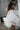Ivory lace dress for flowergirls shown in motion - soft flowing fabric and elegant silhouette