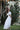 Girls ivory formal outfit with ruffle lace top and tiered maxi skirt – perfect for junior bridesmaids or flower girls