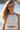 Ivory girls’ dress with delicate lace and layered detail