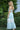 Tween girl wearing Meadow pastel teal lace two-piece set by Tea Princess – halter top and flowy skirt